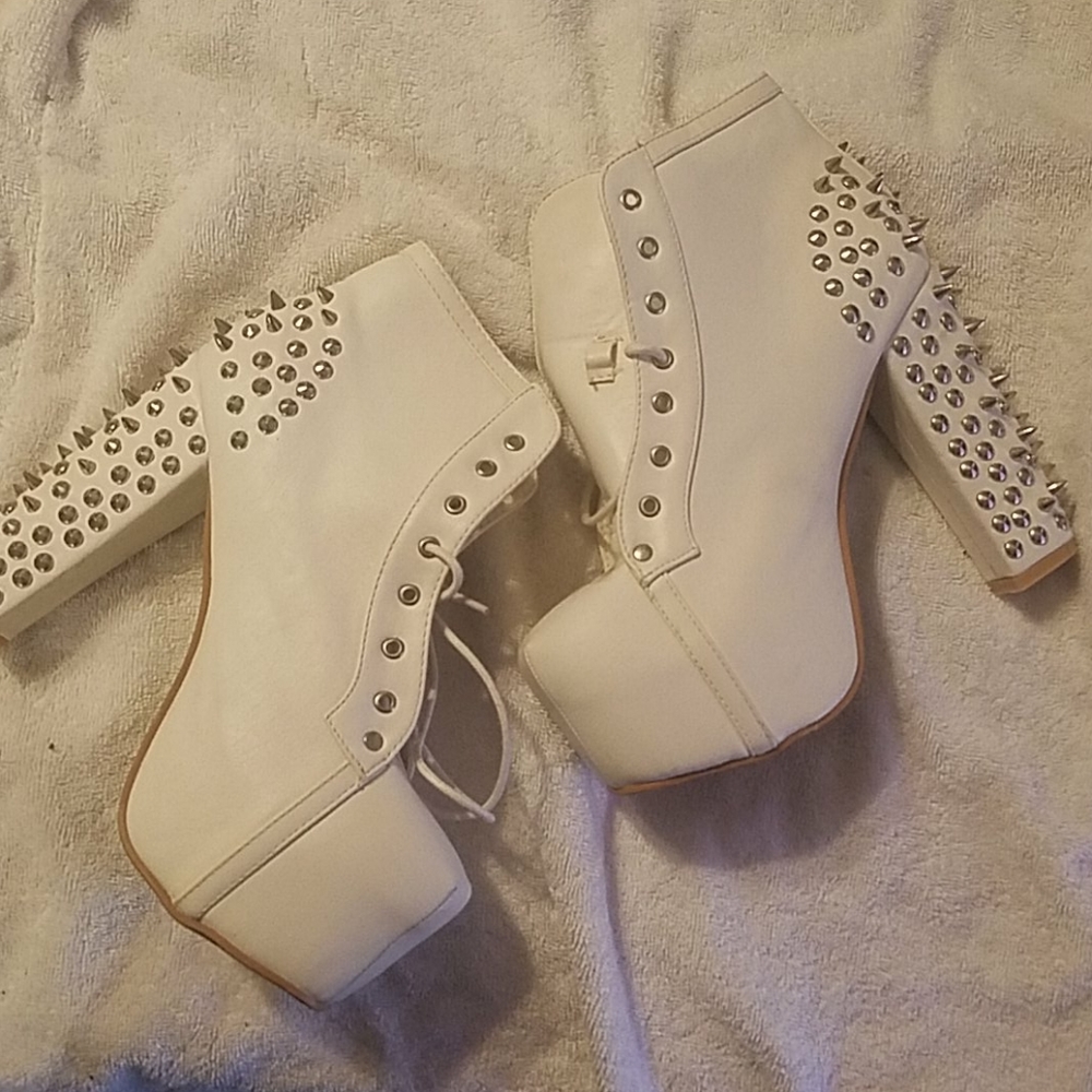 White spiked platform heels